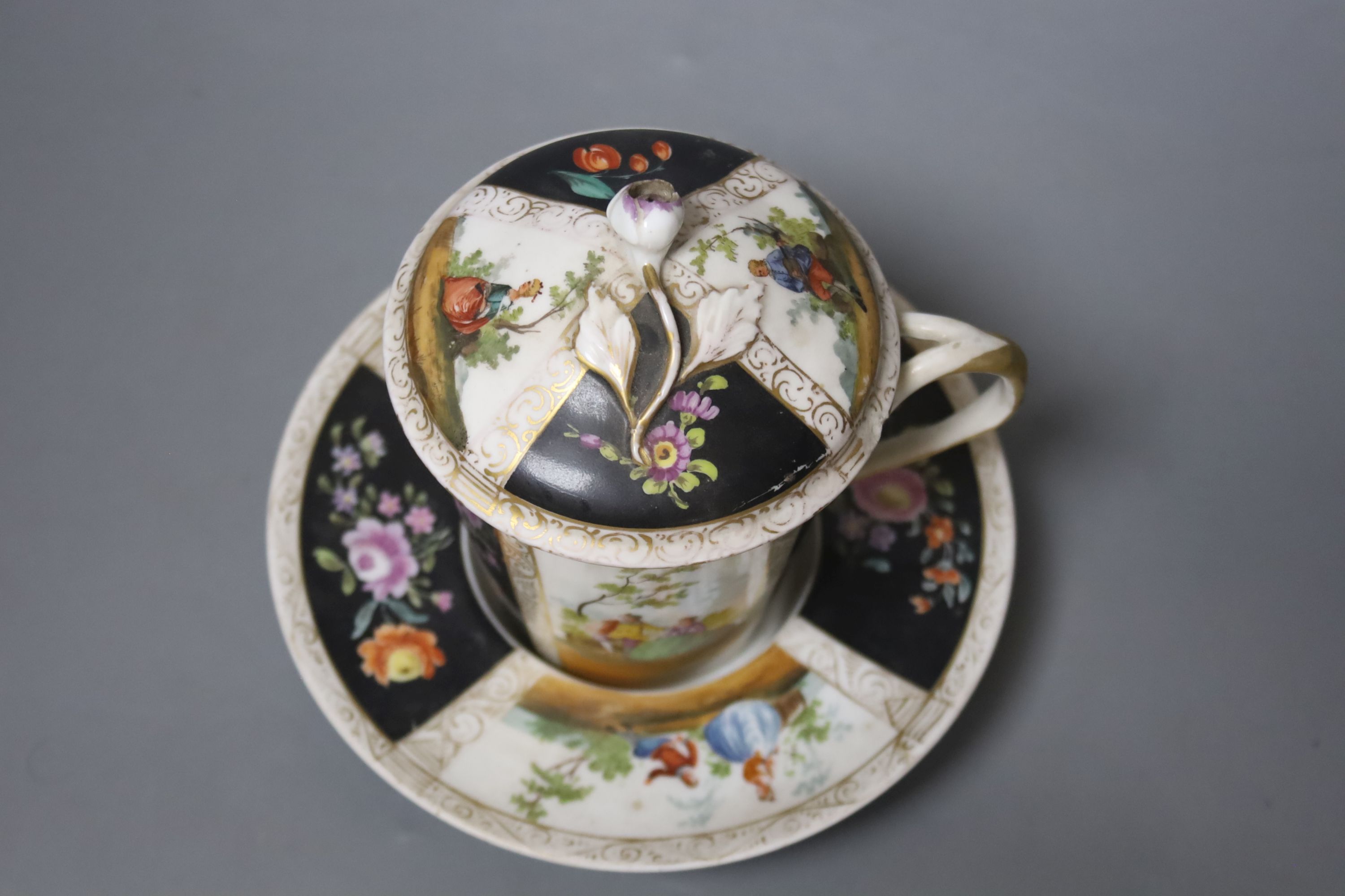 A late 19th century Dresden chocolate cup, cover and stand, overall height 15cm